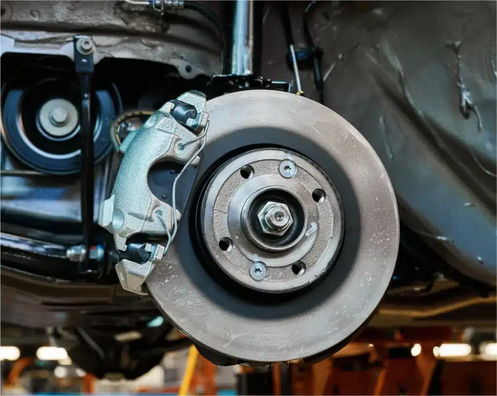 Pleasant Automotive brake repair in Wake Forest, NC. A close up of a car wheel