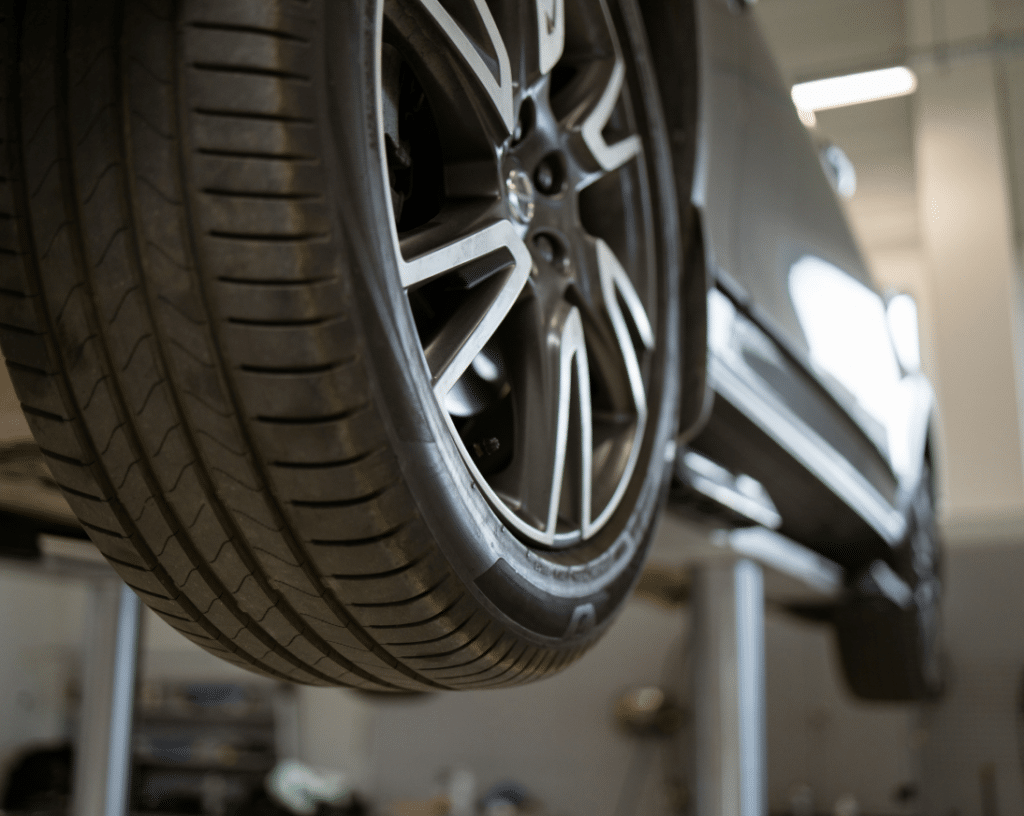 Pleasant Automotive European auto repair in Wake Forest, NC. a car on a lift