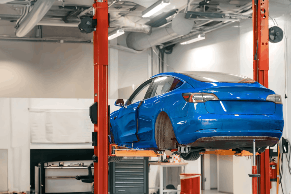 Tesla Service in Wake Forest, NC -Pleasant automotive -Electric car at bay being examined